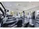 Brightly lit gym with treadmills, elliptical machines, weight-lifting machines, and various other exercise equipment at 128 Fulbourn Pl., Myrtle Beach, SC 29579