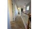 Upstairs hallway with carpet and decorated railing, leading to the bedrooms and other areas at 128 Fulbourn Pl., Myrtle Beach, SC 29579