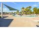 A community pool with shade umbrellas, lounge chairs, and wading pool that is Gathering-friendly at 128 Fulbourn Pl., Myrtle Beach, SC 29579