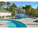 A colorful splash pad with slides, buckets, and spraying water features for enjoyment at 128 Fulbourn Pl., Myrtle Beach, SC 29579