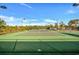 A fenced tennis court offers a recreational space for active residents in this welcoming community at 128 Fulbourn Pl., Myrtle Beach, SC 29579