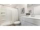 Clean bathroom with a walk-in shower, white vanity, and modern fixtures at 218 Carver Willow Dr., Loris, SC 29569
