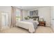 Cozy bedroom featuring neutral decor, a comfortable bed, and natural light at 218 Carver Willow Dr., Loris, SC 29569