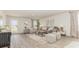 Inviting living room with neutral decor, wood-look floors, and large windows at 218 Carver Willow Dr., Loris, SC 29569
