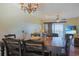 Elegant dining space features a large table and open access to the living area at 300 63Rd Ave. N # 306-C, North Myrtle Beach, SC 29582