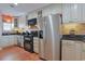 Classic kitchen showcasing stainless steel appliances, black countertops, and plenty of cabinet space at 300 63Rd Ave. N # 306-C, North Myrtle Beach, SC 29582