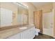 Bright bathroom with a granite countertop, neutral walls, a shower and a toilet at 4240 Coquina Harbour Dr. # E-4, Little River, SC 29566