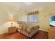 Relaxing bedroom featuring a comfortable bed, beach-themed decor and light yellow walls at 4240 Coquina Harbour Dr. # E-4, Little River, SC 29566