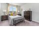 Comfortable bedroom featuring a full bed, stylish gray bedding, and dark wood furnishings at 531 Slaty Dr., Myrtle Beach, SC 29588