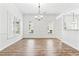 Dining room with hardwood floors and chandelier at 6375 Longwood Dr., Murrells Inlet, SC 29576