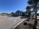 Community clubhouse with ample parking and welcoming exterior at 736 Salerno Circle # D, Myrtle Beach, SC 29579