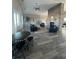 Community room with a fireplace, comfortable seating and large windows at 736 Salerno Circle # D, Myrtle Beach, SC 29579