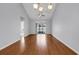 Spacious living room with hardwood floors and vaulted ceiling at 736 Salerno Circle # D, Myrtle Beach, SC 29579