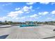 Community pool with plenty of lounge chairs at 736 Salerno Circle # D, Myrtle Beach, SC 29579