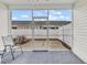 Screened porch with backyard access and patio seating at 736 Salerno Circle # D, Myrtle Beach, SC 29579