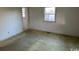 Primary bedroom with carpet and window at 807 Anne St., North Myrtle Beach, SC 29582