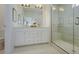 Bright bathroom with glass enclosed shower, double vanity, and modern fixtures creates a spa-like atmosphere at 8476 Duke Pl. # 32, Myrtle Beach, SC 29572