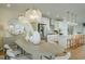 Elegant dining area adjacent to the kitchen, featuring modern lighting and stylish decor at 8476 Duke Pl. # 32, Myrtle Beach, SC 29572