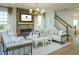 Inviting living room showcasing a fireplace, comfortable seating, and stylish accents at 8476 Duke Pl. # 32, Myrtle Beach, SC 29572