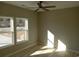 Bright bedroom with hardwood floors, ceiling fan and windows at 941 Hickman Rd., Tabor City, NC 28463