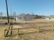 A view of the front and side yard of the home showing new fencing and new construction at 941 Hickman Rd., Tabor City, NC 28463