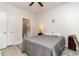 Calm bedroom with a doorway view to an attached bath with stylish tiled shower at 109 S Shore Blvd. # 104, Longs, SC 29568