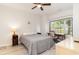 Comfortable bedroom with natural light, desk, and neutral color palette at 109 S Shore Blvd. # 104, Longs, SC 29568