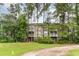Multi-story home features well-maintained landscaping and a welcoming facade at 109 S Shore Blvd. # 104, Longs, SC 29568