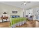 Bright bedroom with a metal bed frame and window seating at 112 Cockle Shell Ct., Pawleys Island, SC 29585