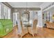 Bright dining area with a charming round table and four chairs at 112 Cockle Shell Ct., Pawleys Island, SC 29585
