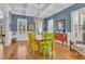 Formal dining room with hardwood floors, chandelier, and blue walls at 112 Cockle Shell Ct., Pawleys Island, SC 29585