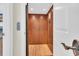 Modern home elevator with wood paneling and flooring at 112 Cockle Shell Ct., Pawleys Island, SC 29585