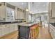 Well-equipped kitchen with island, light-colored cabinetry, and hardwood floors at 112 Cockle Shell Ct., Pawleys Island, SC 29585