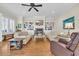 Comfortable living room with a fireplace and built-in shelving at 112 Cockle Shell Ct., Pawleys Island, SC 29585