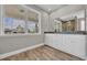 Bathroom featuring double sinks with granite countertops and a large window at 1151 Bear Lake Dr., Longs, SC 29568