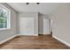 Bedroom features wood floors, closet with double doors, and natural light at 1151 Bear Lake Dr., Longs, SC 29568