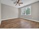 Bedroom with hardwood floors and a window that brings in natural light at 1151 Bear Lake Dr., Longs, SC 29568