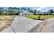 Charming one-story home with white painted brick, landscaping and a long driveway at 1151 Bear Lake Dr., Longs, SC 29568