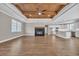 Open floor plan with fireplace, hardwood floors, and kitchen at 1151 Bear Lake Dr., Longs, SC 29568