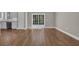 Open floor plan with views of the kitchen and large sliding glass doors at 1151 Bear Lake Dr., Longs, SC 29568