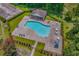 An aerial view of a community pool featuring lounge chairs, tables and a covered pavilion at 1151 Bear Lake Dr., Longs, SC 29568