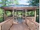 A covered gazebo located next to a river for peaceful relaxation and serene views at 1522 Clubstone Dr., Conway, SC 29526