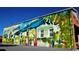 Colorful mural showcasing the Welcome to Conway sign with vibrant art and architecture at 1522 Clubstone Dr., Conway, SC 29526