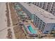 Aerial view highlighting the building's multiple pools, boardwalk, and oceanfront location at 2311 S Ocean Blvd. # 1125, Myrtle Beach, SC 29577