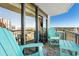 A relaxing balcony space with comfortable seating and scenic city views at 2311 S Ocean Blvd. # 1125, Myrtle Beach, SC 29577