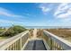 Direct beach access path with wooden boardwalk and scenic ocean views at 2311 S Ocean Blvd. # 1125, Myrtle Beach, SC 29577