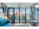 Living room showcasing blue accents and balcony access with ocean view at 2311 S Ocean Blvd. # 1125, Myrtle Beach, SC 29577