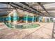 Indoor pool and spa area with steps leading to the warm water at 2311 S Ocean Blvd. # 1125, Myrtle Beach, SC 29577