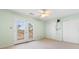 Bright bedroom with double doors leading to a private balcony at 305 21St Ave. S # 108, Myrtle Beach, SC 29577