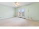 Spacious bedroom featuring carpet and private balcony at 305 21St Ave. S # 108, Myrtle Beach, SC 29577